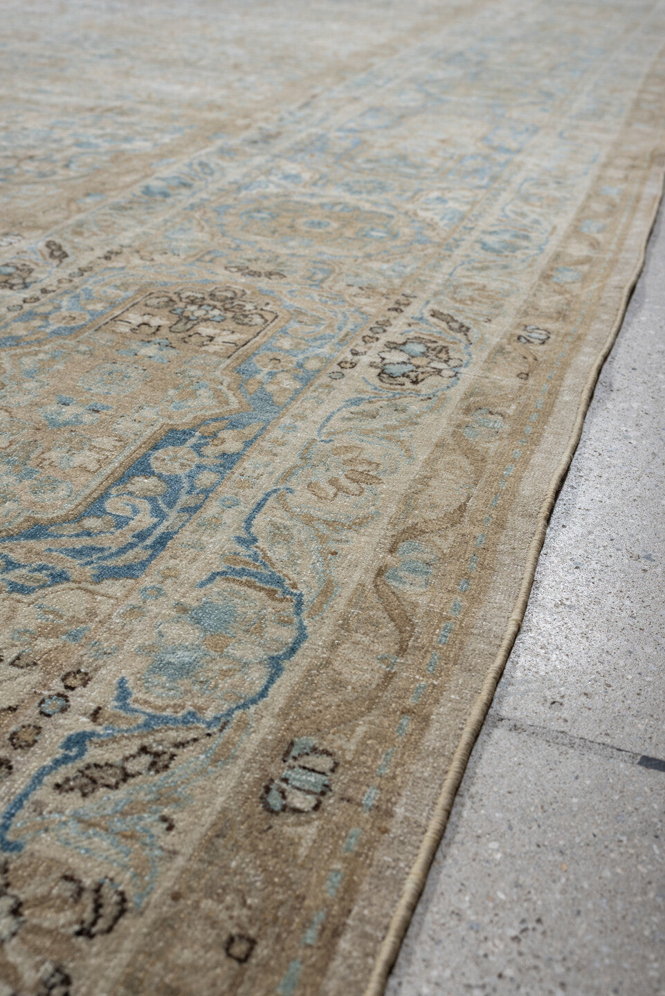 12' x 23' one-of-a-kind handmade vintage Kerman oversize rug. Color palette: ivory, sky blue, taupe, beige, slate, sand