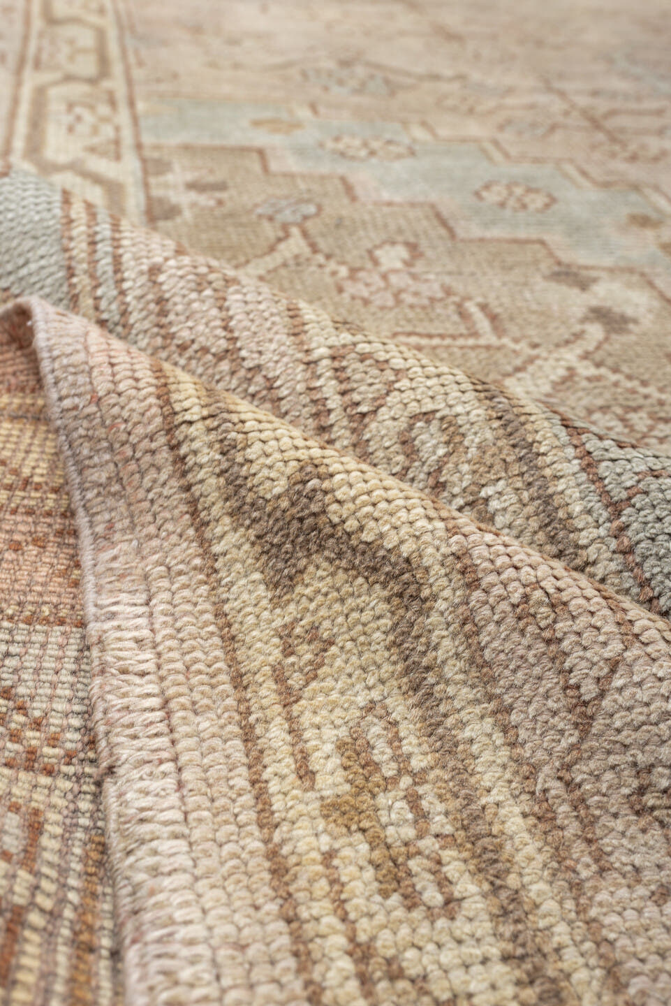 12' x 18' one-of-a-kind handmade antique Oushak oversize rug. Color palette: ivory, taupe, pale blue, faded terracotta