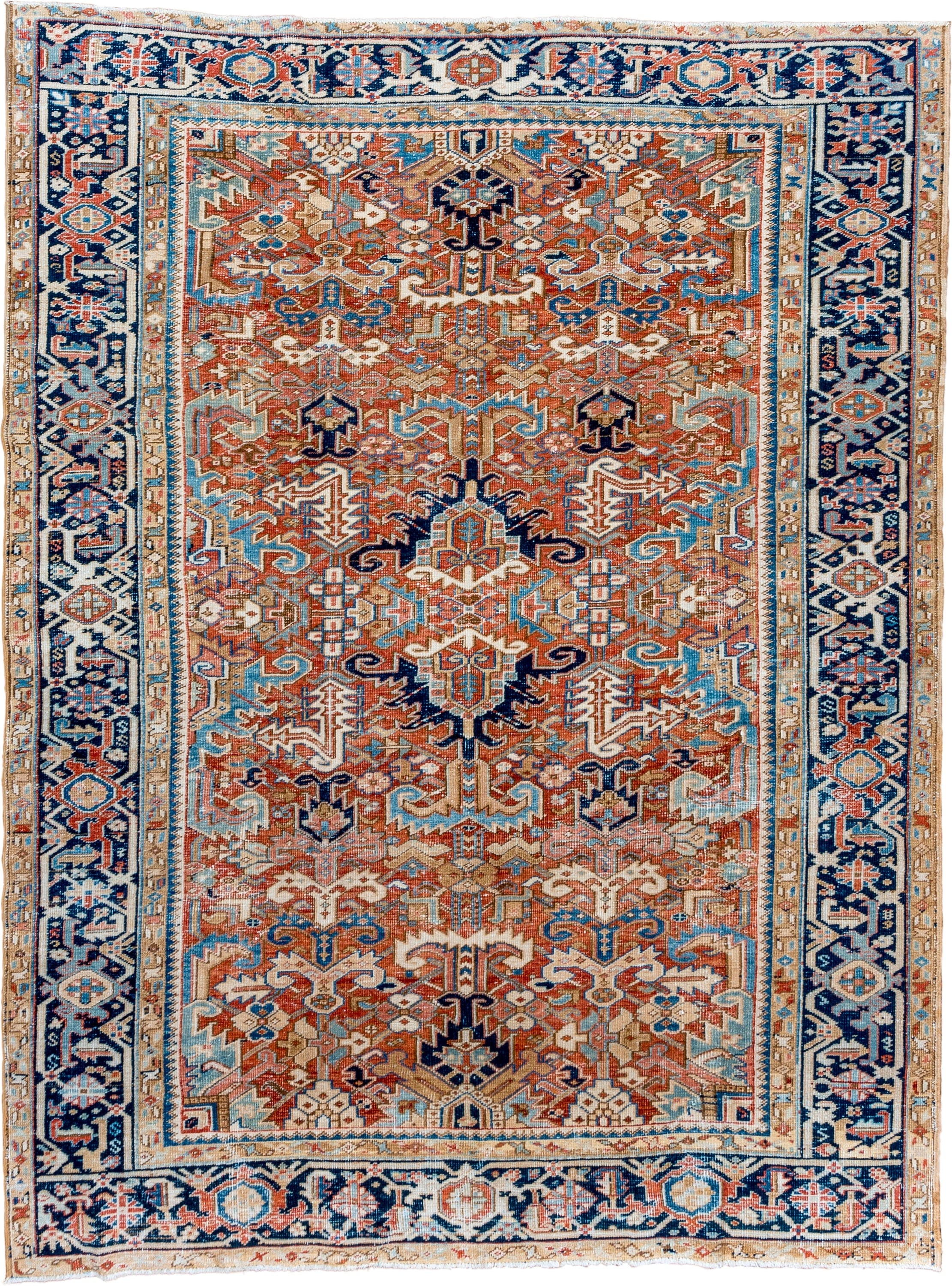 7' x 10' one-of-a-kind handmade vintage Heriz large size rug. Color palette: terra cotta, navy, ivory, sky blue, camel, rust