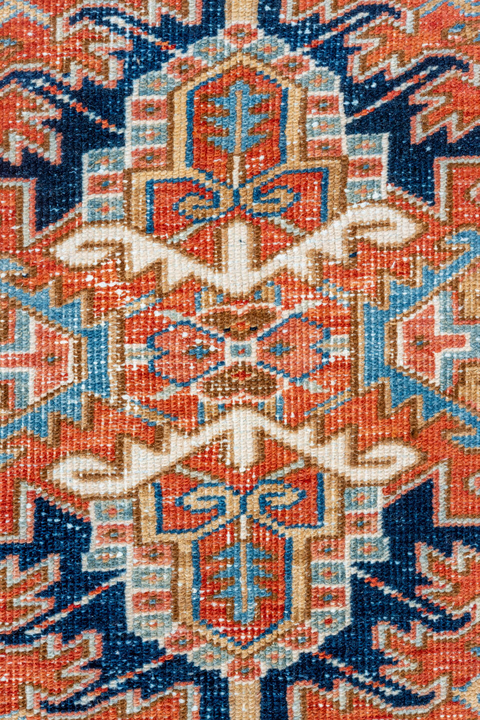 7' x 10' one-of-a-kind handmade vintage Heriz large size rug. Color palette: terra cotta, navy, ivory, sky blue, camel, rust