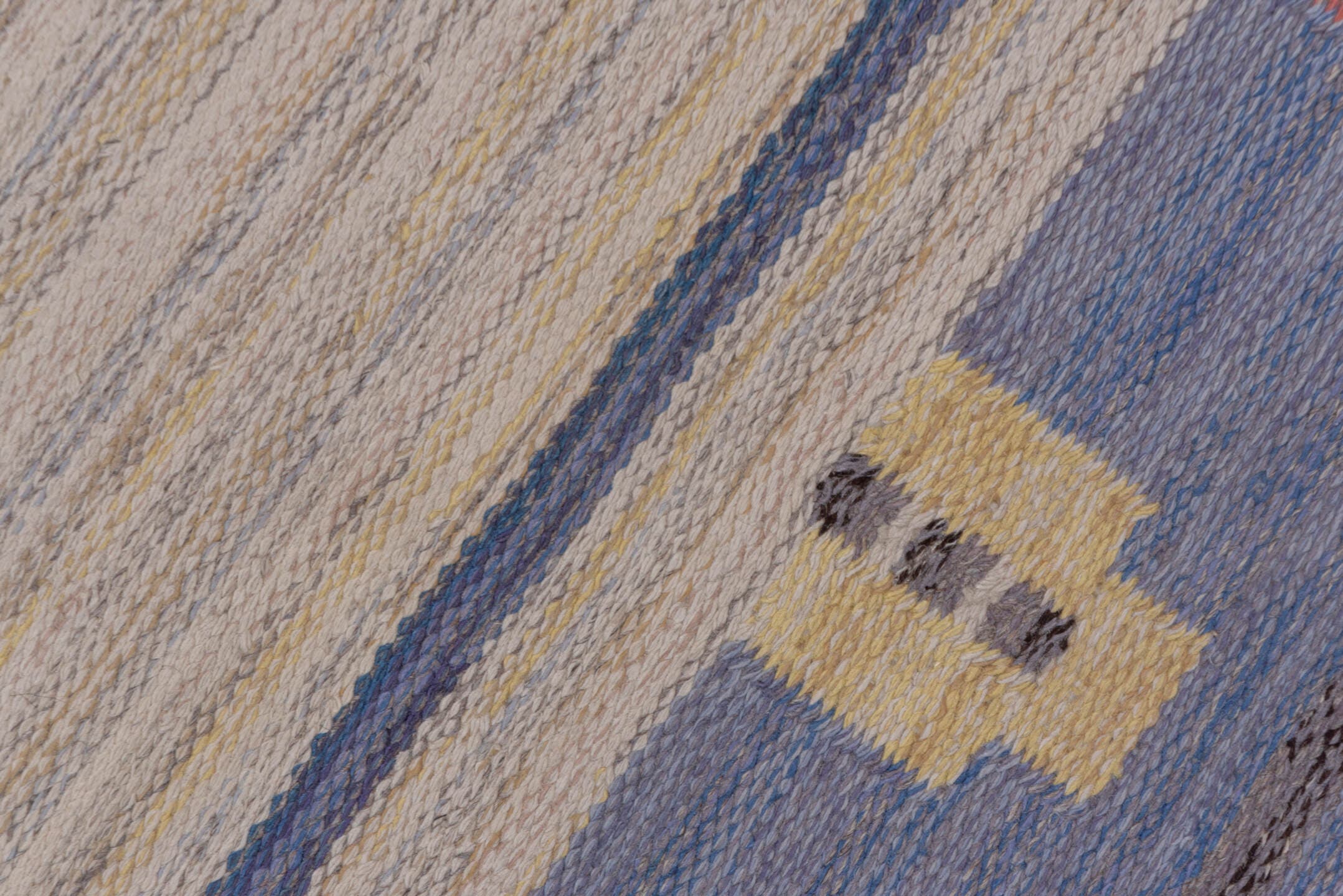6' x 10' one-of-a-kind handmade vintage Rollaken large size rug. Color palette: ivory, slate blue, periwinkle, cream