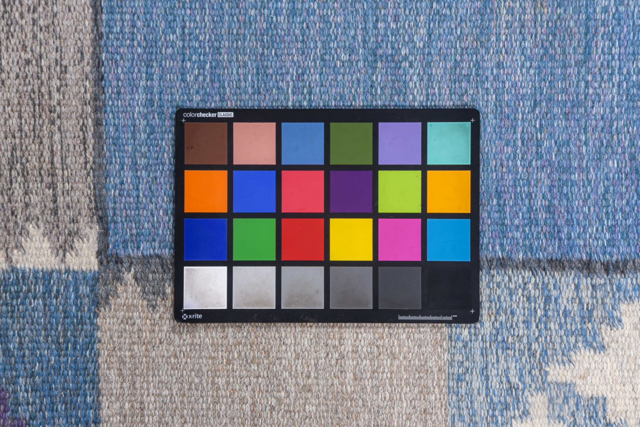 6' x 9' one-of-a-kind handmade vintage Rollaken medium size rug. Color palette: blue, gray, light blue, light gray