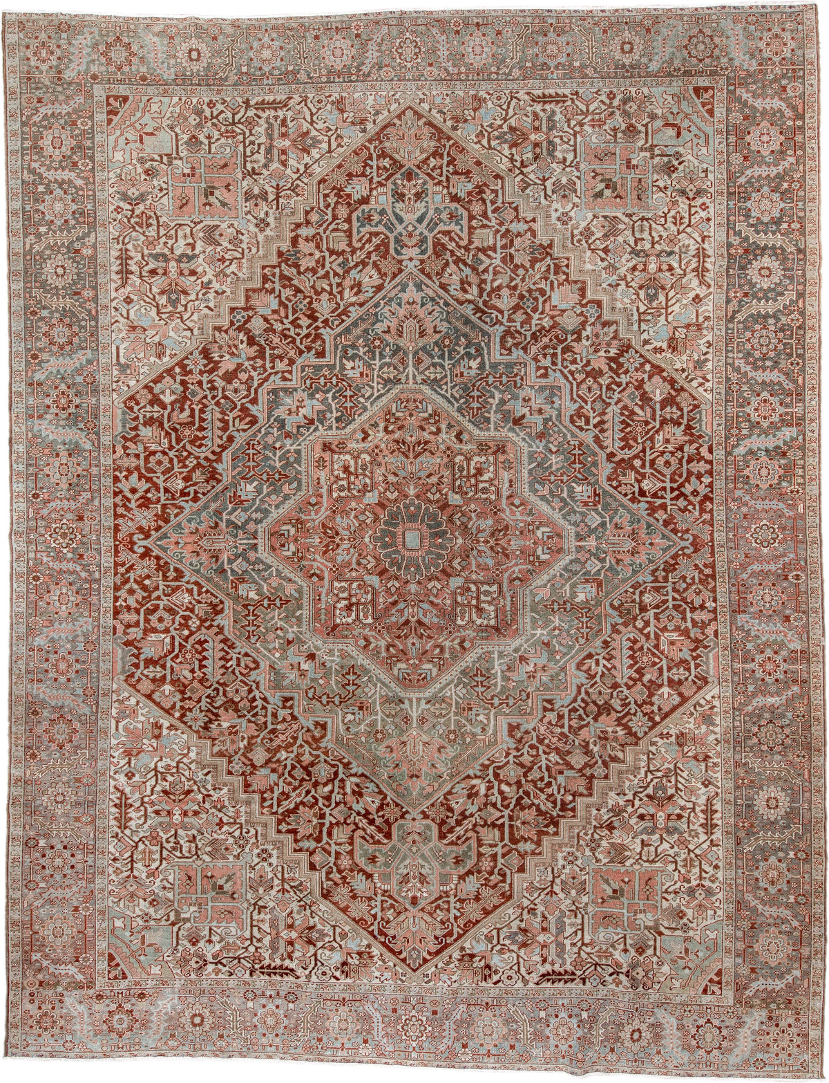 11' x 15' one-of-a-kind handmade antique Heriz oversize rug. Color palette: rust, ivory, sage, slate blue, dusty rose, taupe