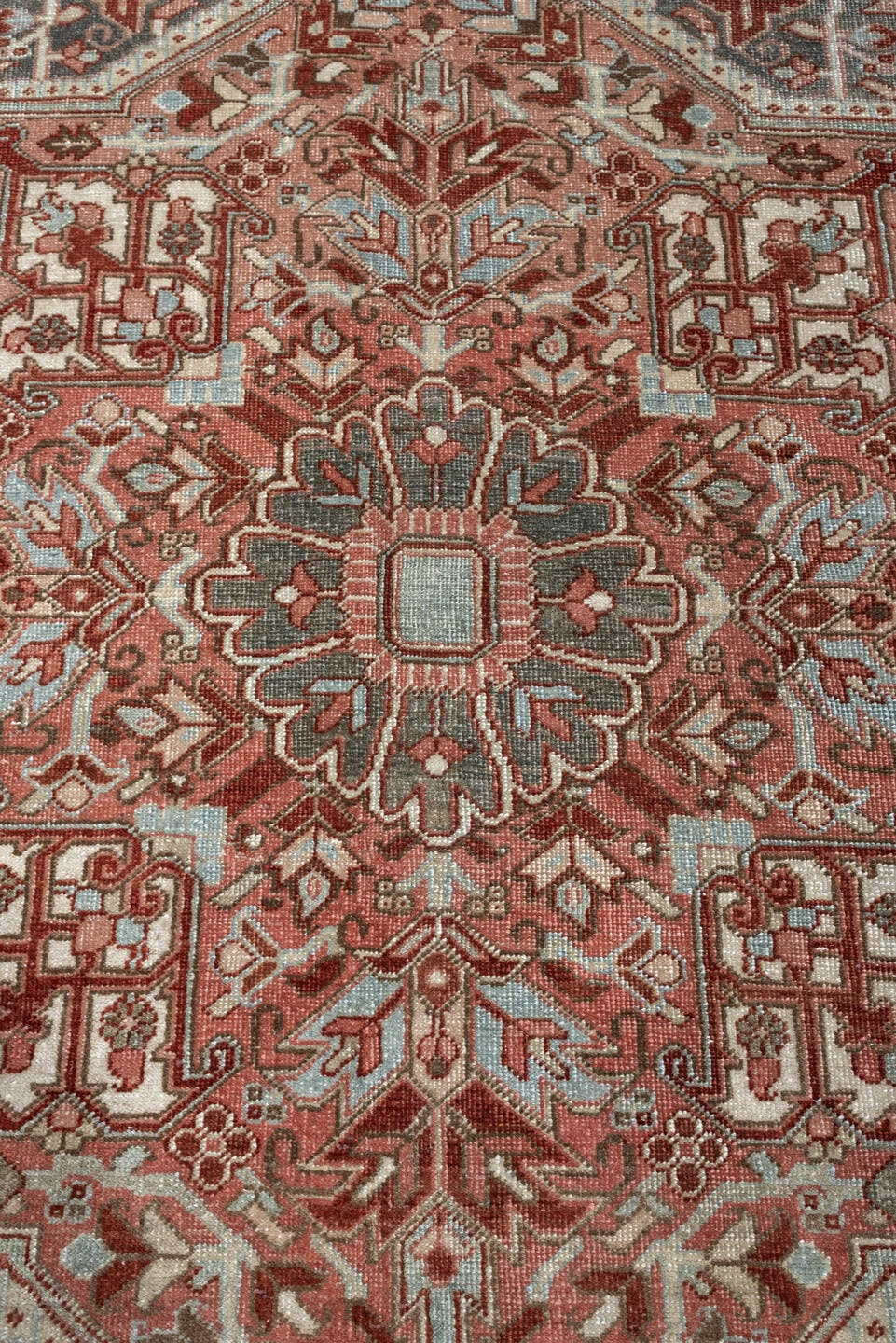 11' x 15' one-of-a-kind handmade antique Heriz oversize rug. Color palette: rust, ivory, sage, slate blue, dusty rose, taupe