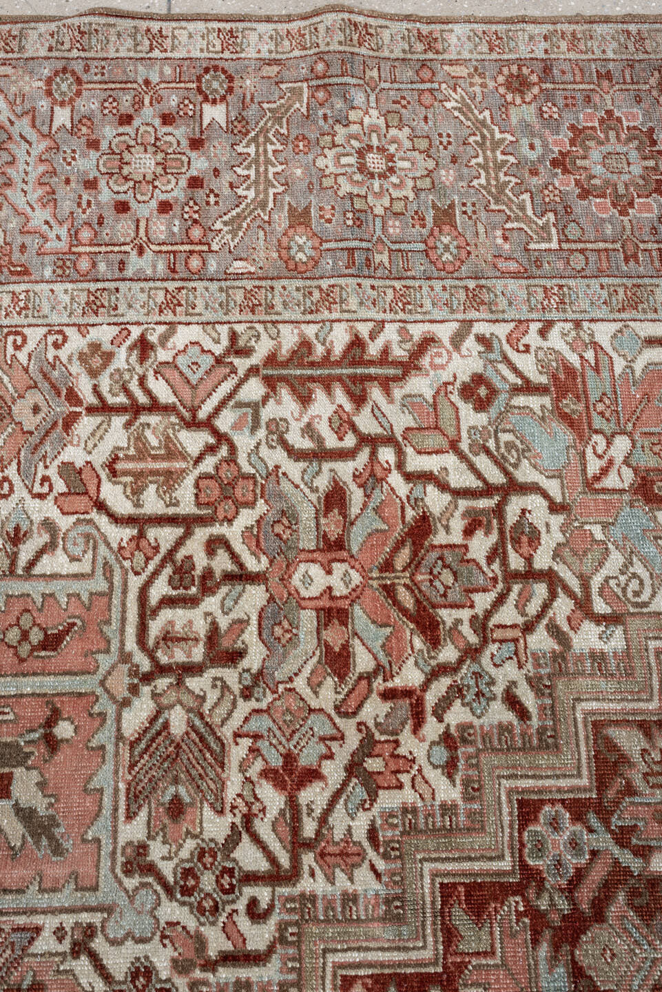11' x 15' one-of-a-kind handmade antique Heriz oversize rug. Color palette: rust, ivory, sage, slate blue, dusty rose, taupe