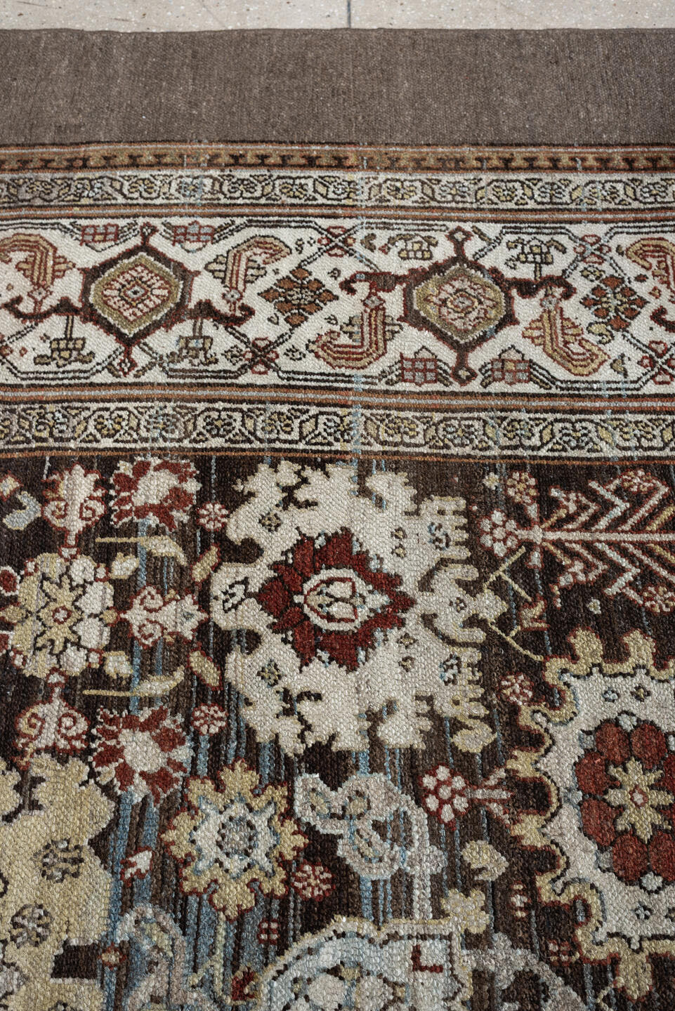 11' x 19' one-of-a-kind handmade antique Bibikabad oversize rug. Color palette: ivory, taupe, ebony, powder blue, rust