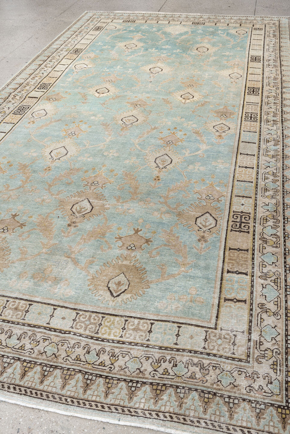 6' x 12' one-of-a-kind handmade antique Khotan large size rug. Color palette: aqua, ivory, beige, tan, taupe, charcoal