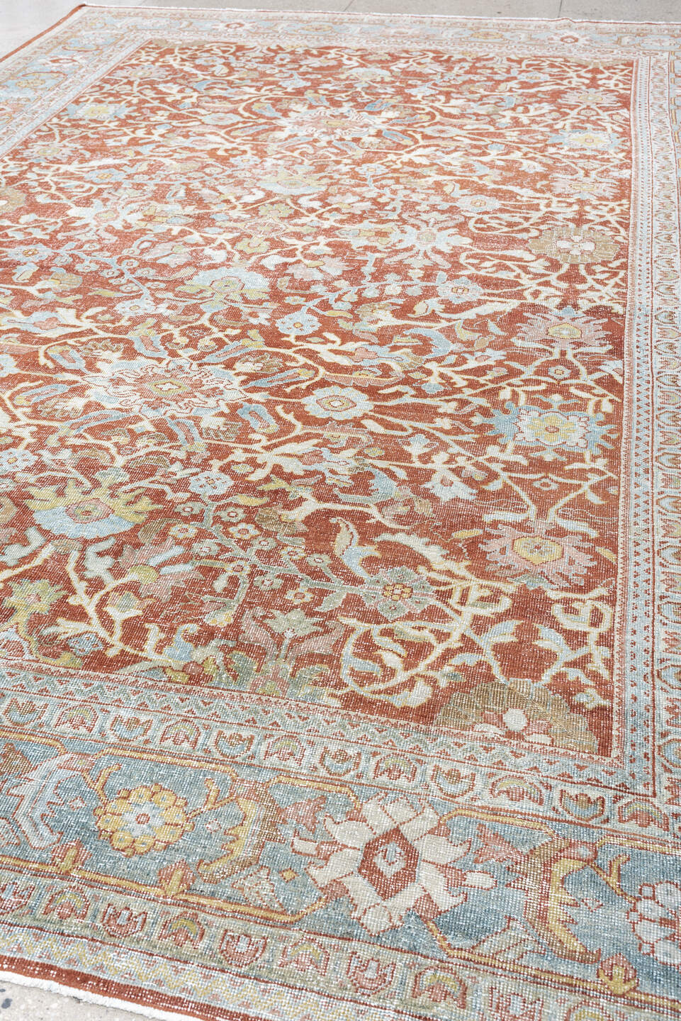 9' x 13' one-of-a-kind handmade antique Mahal large size rug. Color palette: terracotta, pale blue, ivory, sage, rust