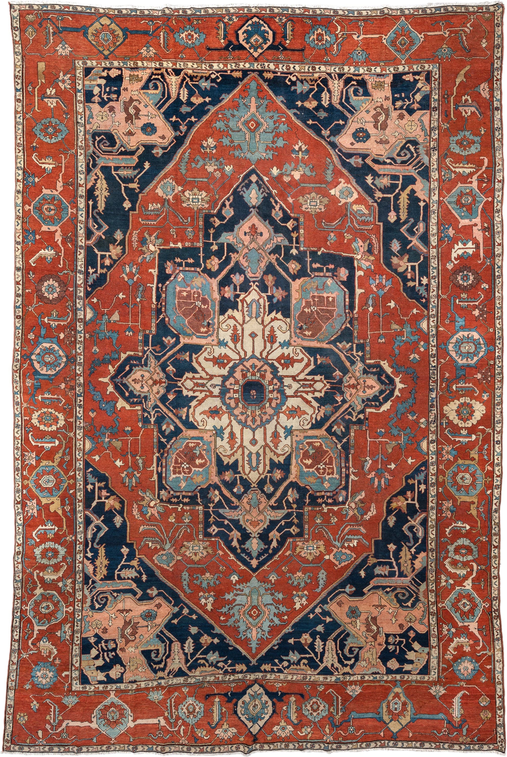 11' x 16' one-of-a-kind handmade antique Serapi oversize rug. Color palette: terracotta, navy, ivory, sky blue, camel, rose