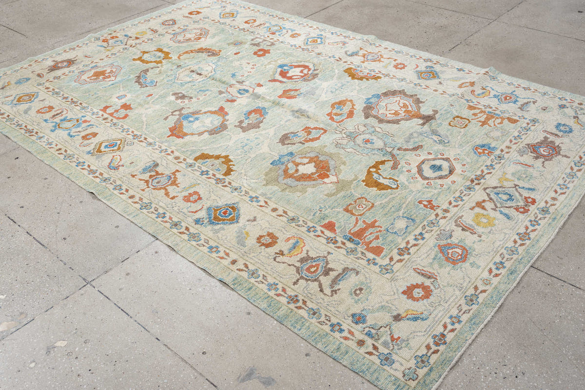 6' x 9' one-of-a-kind handmade vintage Sultanabad medium size rug. Color palette: pale aqua, ivory, coral, sky blue, taupe