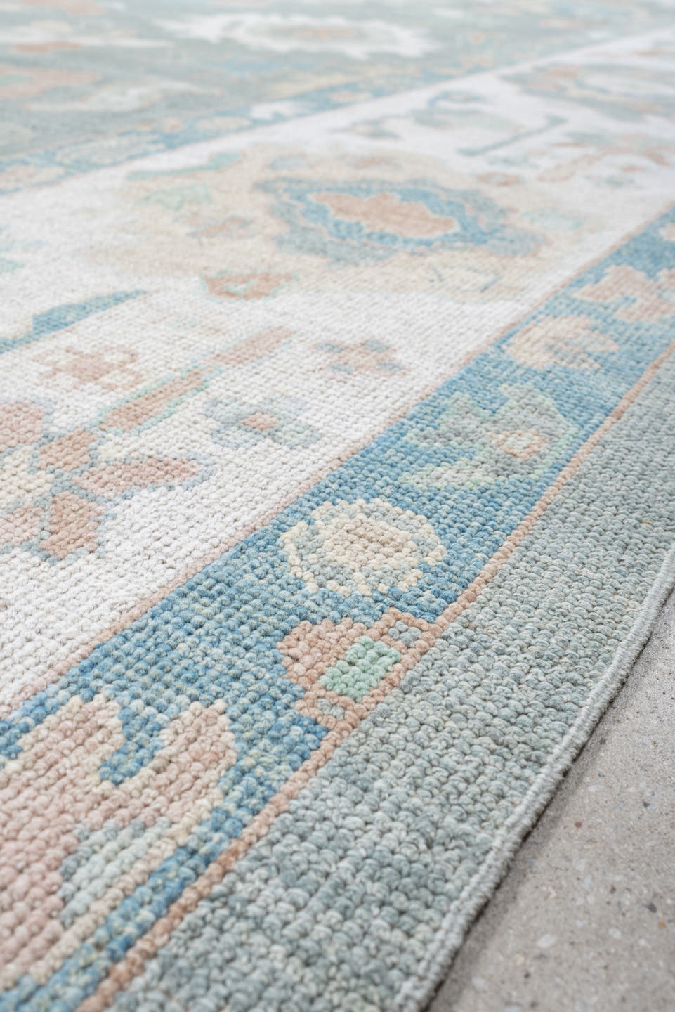 10' x 14' one-of-a-kind handmade vintage Oushak large size rug. Color palette: pale aqua, ivory, blush, sage, taupe, cream