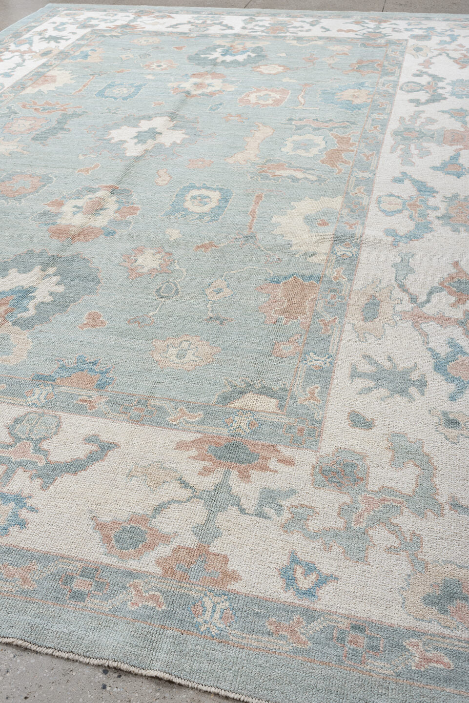 10' x 14' one-of-a-kind handmade vintage Oushak large size rug. Color palette: sky blue, ivory, blush, sage, taupe, peach