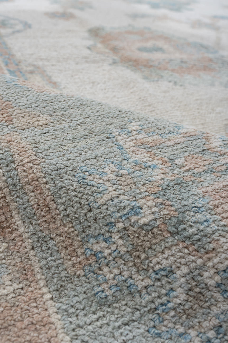 7' x 10' one-of-a-kind handmade vintage Oushak large size rug. Color palette: ivory, pale aqua, blush, taupe, cream, teal