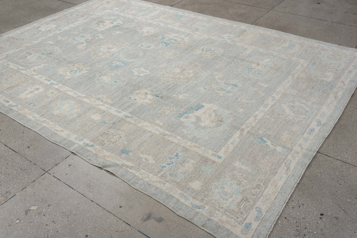 7' x 10' one-of-a-kind handmade vintage Oushak large size rug. Color palette: pale blue, ivory, taupe, cream, sky blue