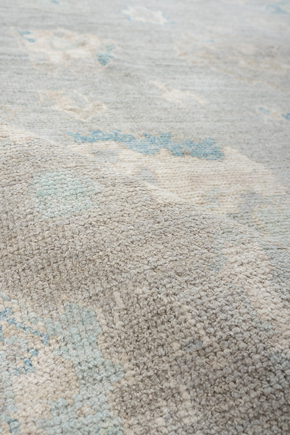 7' x 10' one-of-a-kind handmade vintage Oushak large size rug. Color palette: pale blue, ivory, taupe, cream, sky blue