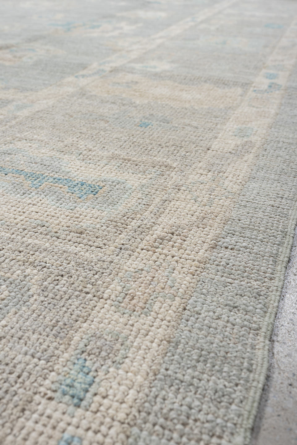 7' x 10' one-of-a-kind handmade vintage Oushak large size rug. Color palette: pale blue, ivory, taupe, cream, sky blue