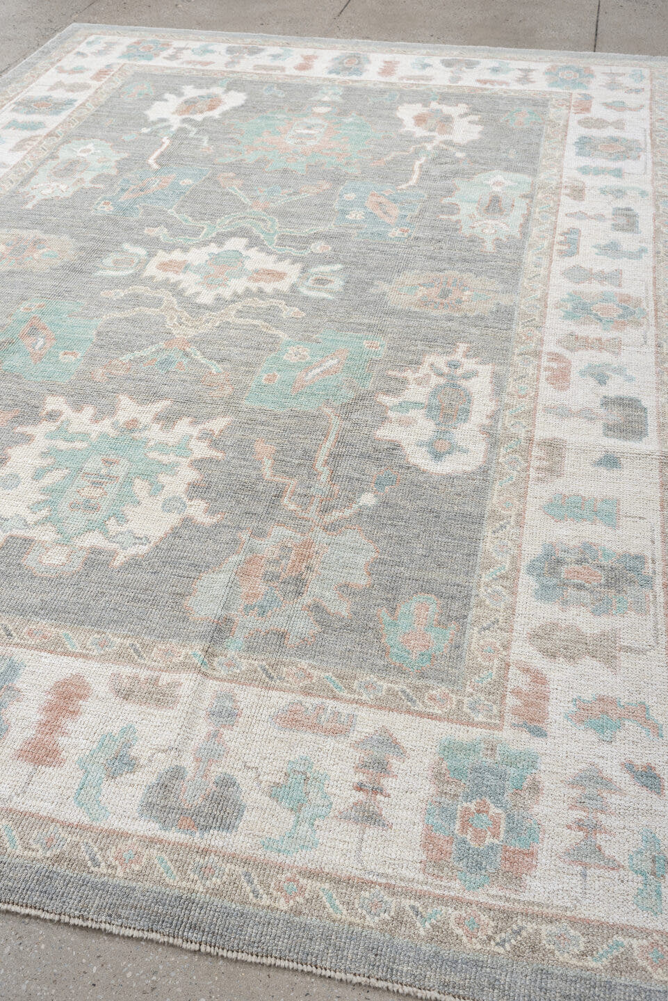 7' x 10' one-of-a-kind handmade vintage Oushak large size rug. Color palette: gray, ivory, pale aqua, blush, taupe, cream