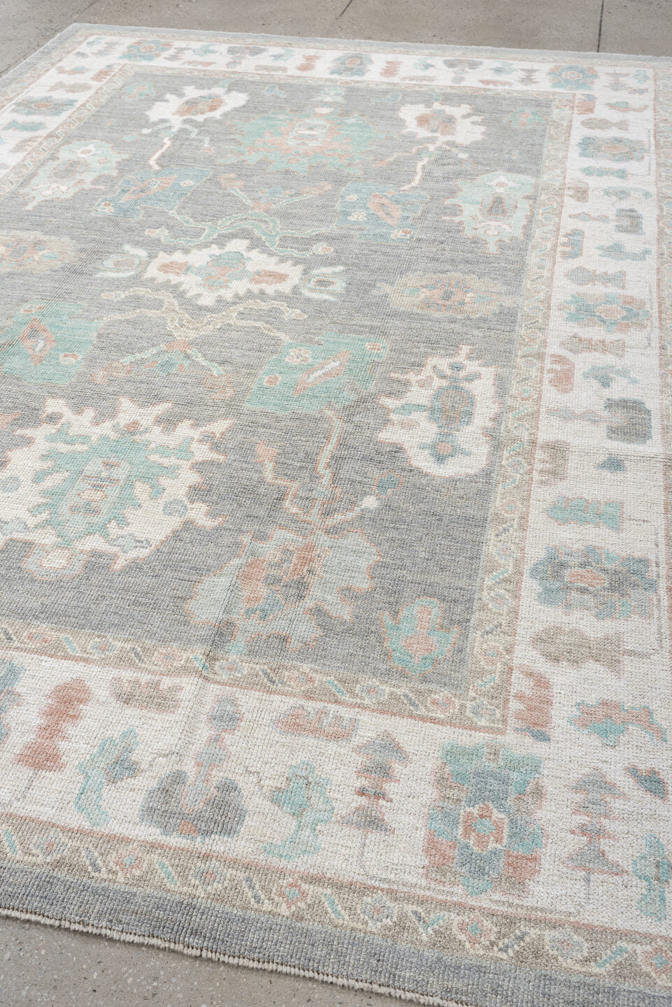 7' x 10' one-of-a-kind handmade vintage Oushak large size rug. Color palette: gray, ivory, pale aqua, blush, taupe, cream