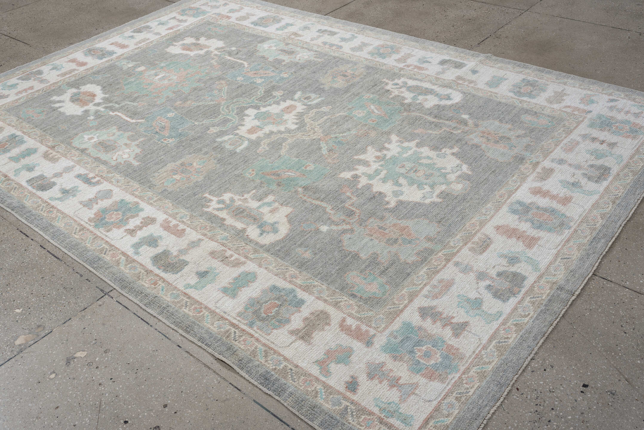 7' x 10' one-of-a-kind handmade vintage Oushak large size rug. Color palette: gray, ivory, pale aqua, blush, taupe, cream