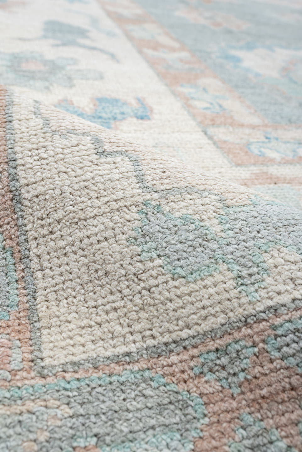 12' x 15' one-of-a-kind handmade vintage Oushak oversize rug. Color palette: sky blue, ivory, blush, pale blue, taupe, sage