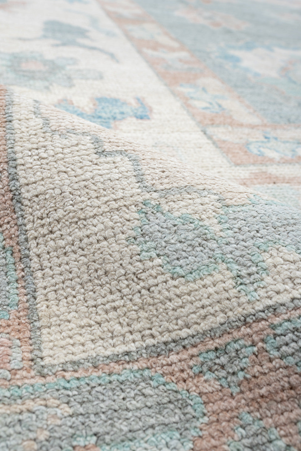 12' x 15' one-of-a-kind handmade vintage Oushak oversize rug. Color palette: sky blue, ivory, blush, pale blue, taupe, sage