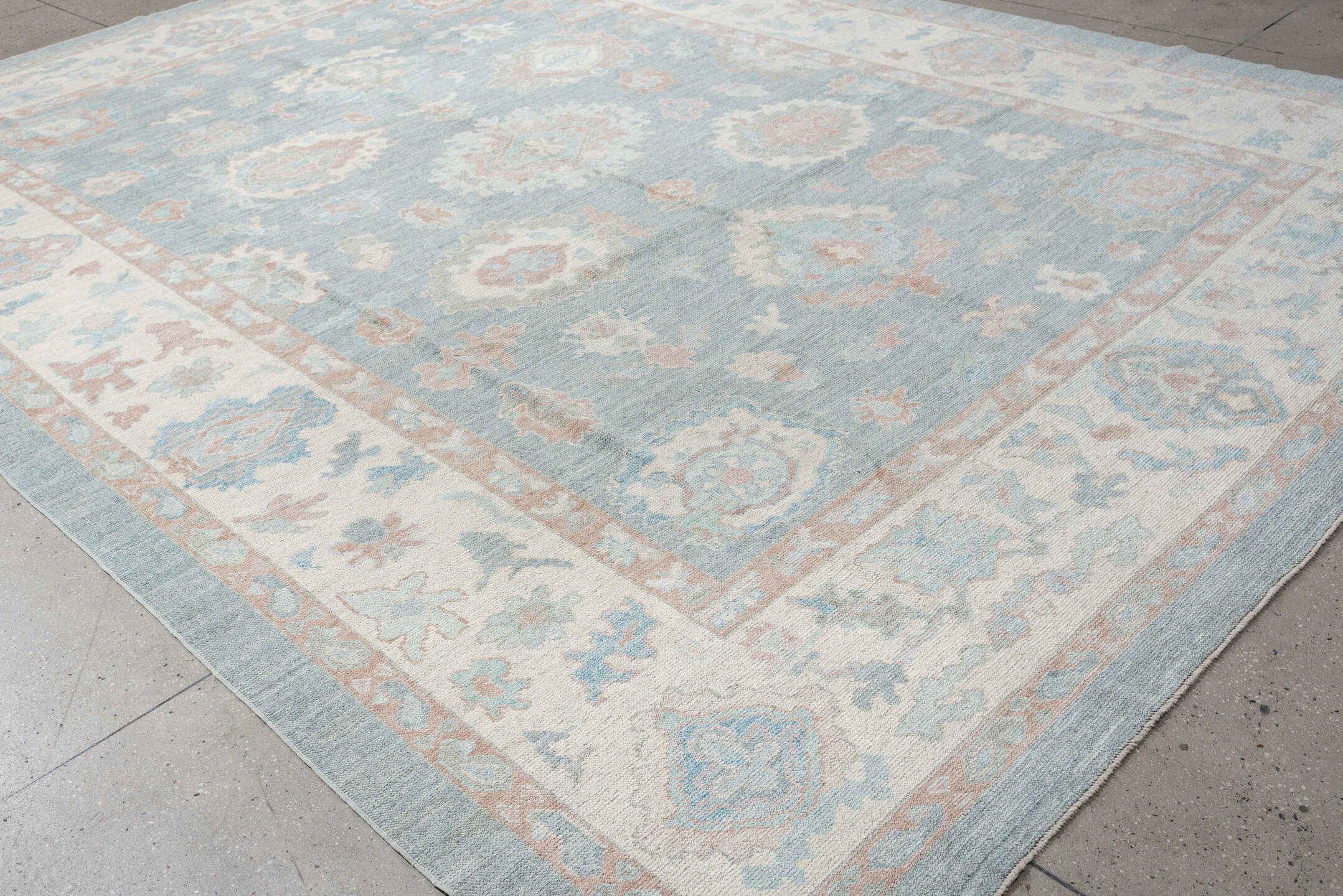10' x 14' one-of-a-kind handmade vintage Oushak large size rug. Color palette: pale blue, ivory, blush, taupe, aqua, peach