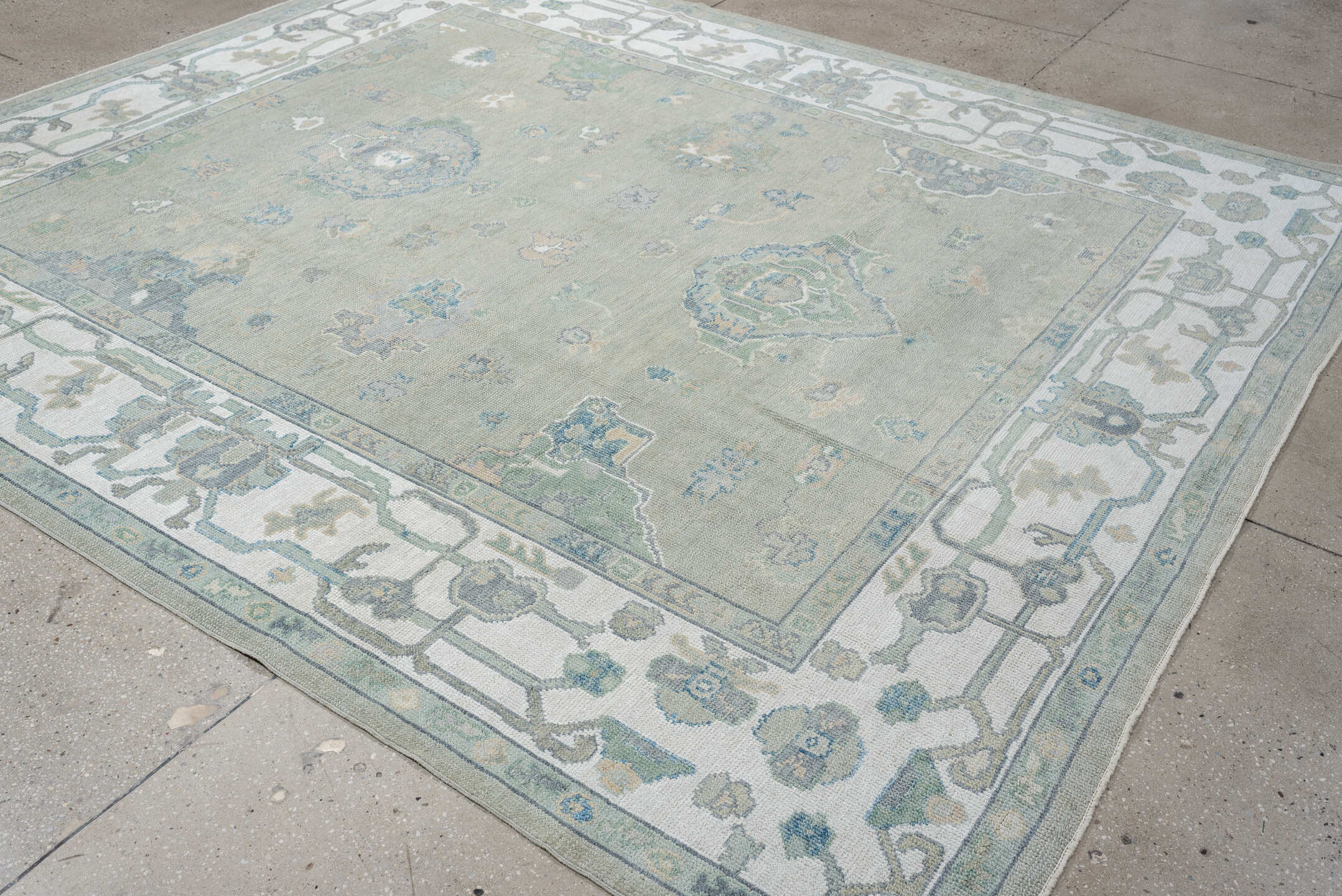 8' x 9' one-of-a-kind handmade vintage Oushak large size rug. Color palette: taupe, ivory, sky blue, sage, soft gold