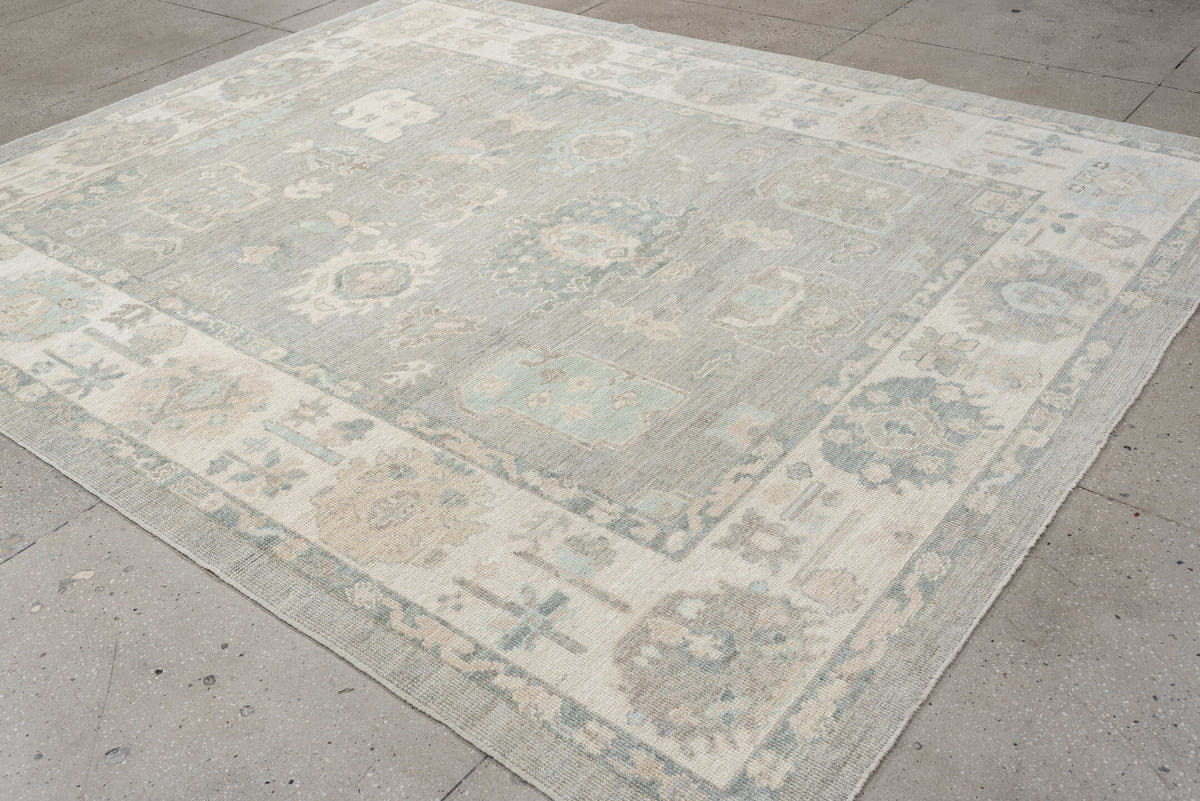 8' x 10' one-of-a-kind handmade vintage Oushak large size rug. Color palette: pale blue, ivory, taupe, cream, sage, beige