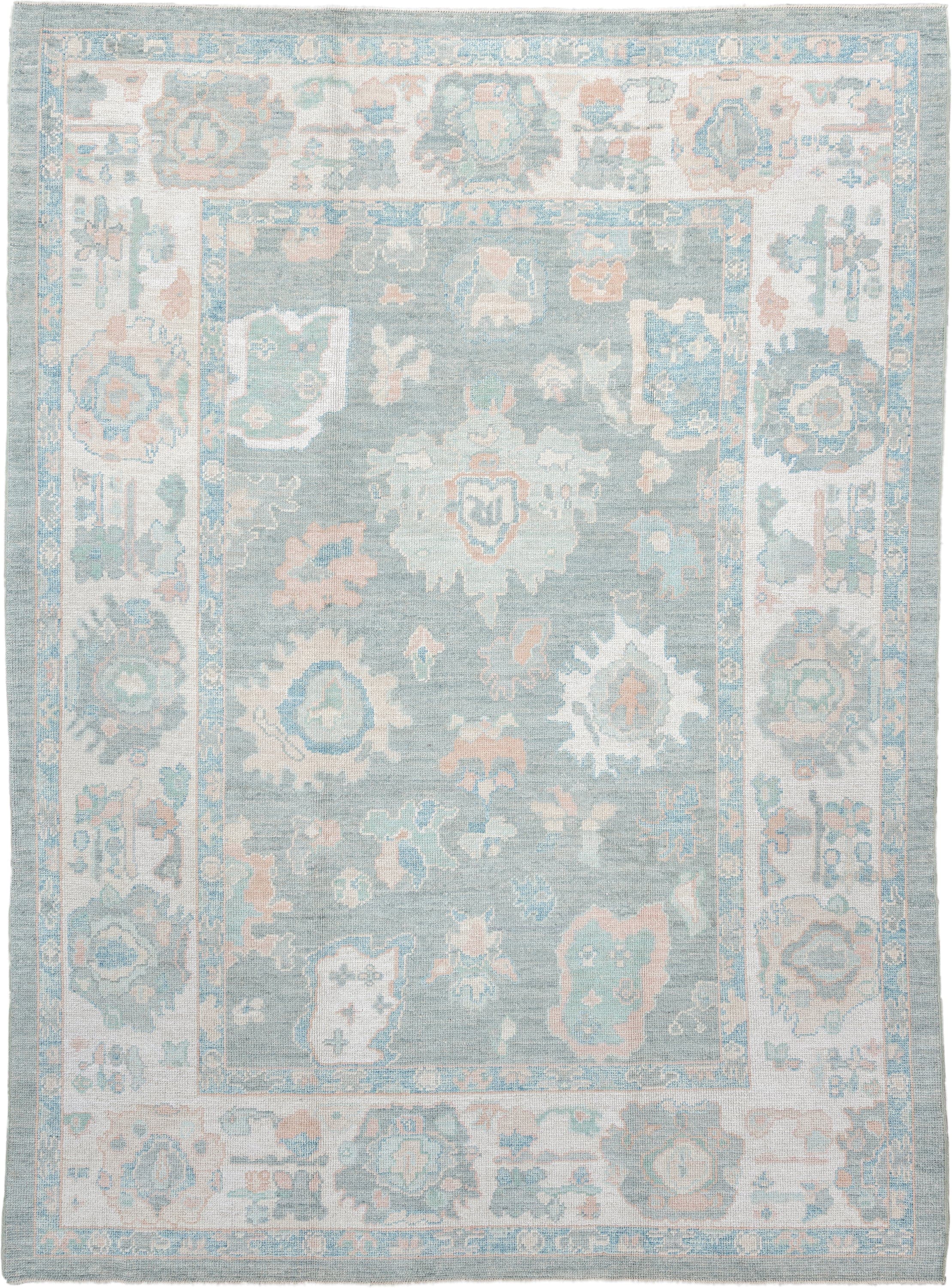 7' x 10' one-of-a-kind handmade vintage Oushak large size rug. Color palette: pale blue, ivory, sage, blush, taupe