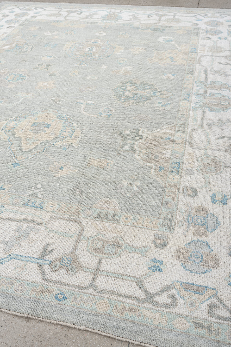 8' x 10' one-of-a-kind handmade vintage Oushak large size rug. Color palette: pale blue, ivory, taupe, sky blue, beige, gray