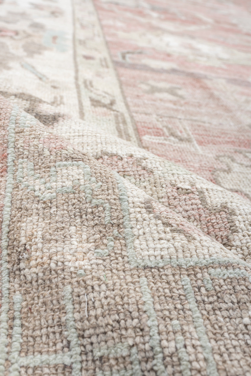 9' x 11' one-of-a-kind handmade vintage Oushak large size rug. Color palette: coral, ivory, sage, taupe, blush, charcoal