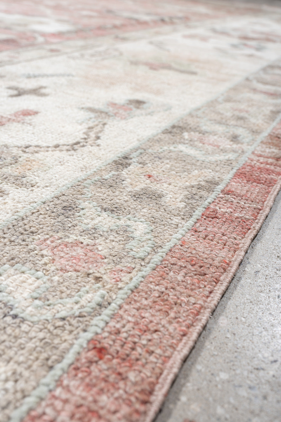 9' x 11' one-of-a-kind handmade vintage Oushak large size rug. Color palette: coral, ivory, sage, taupe, blush, charcoal