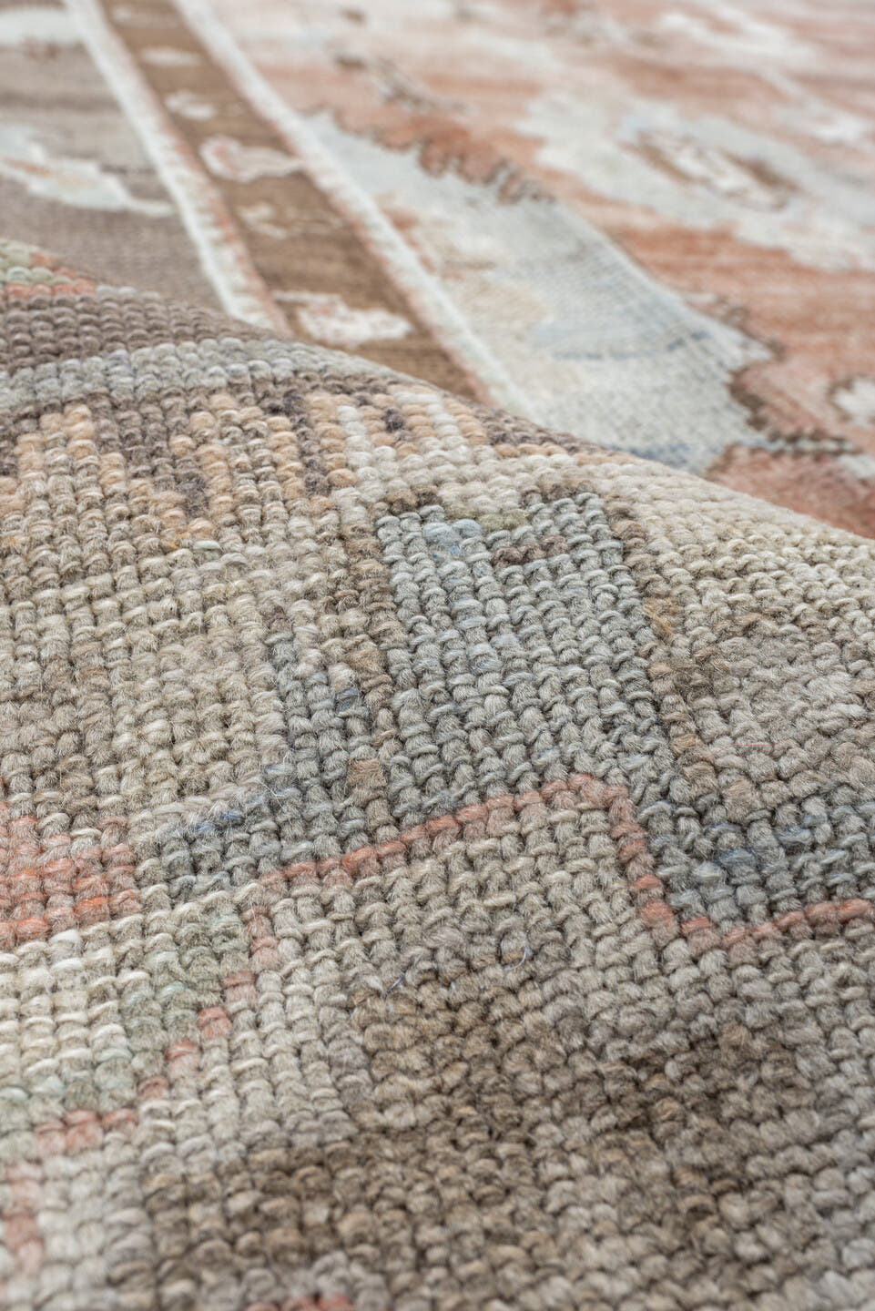 9' x 13' one-of-a-kind handmade vintage Oushak large size rug. Color palette: blush, taupe, ivory, pale blue, peach, sand