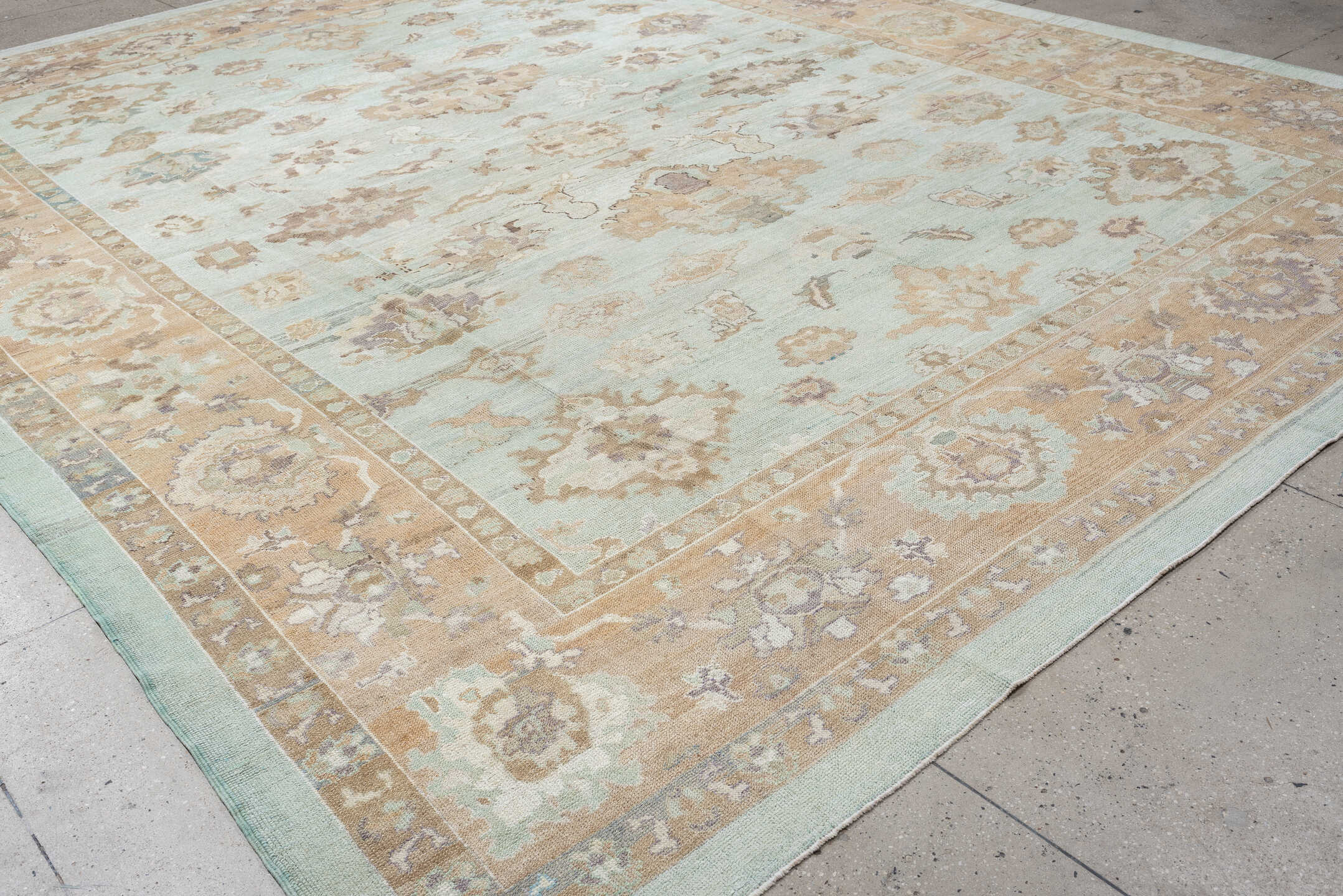 12' x 15' one-of-a-kind handmade vintage Oushak oversize rug. Color palette: aqua, beige, taupe, ivory, sand, rose, sage