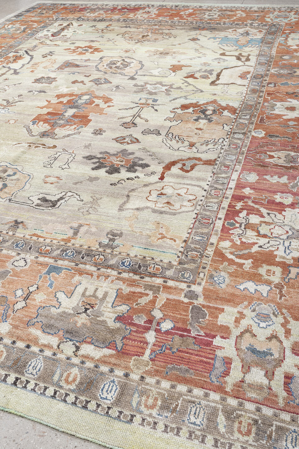 12' x 15' one-of-a-kind handmade vintage Oushak oversize rug. Color palette: ivory, terra cotta, taupe, slate, pale blue
