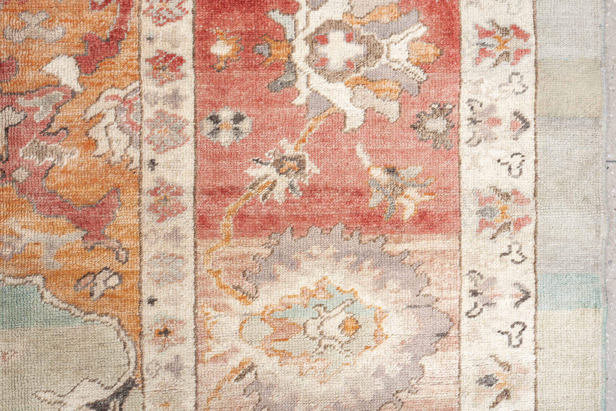 12' x 14' one-of-a-kind handmade vintage Oushak oversize rug. Color palette: sage, coral, ivory, terracotta, taupe, peach