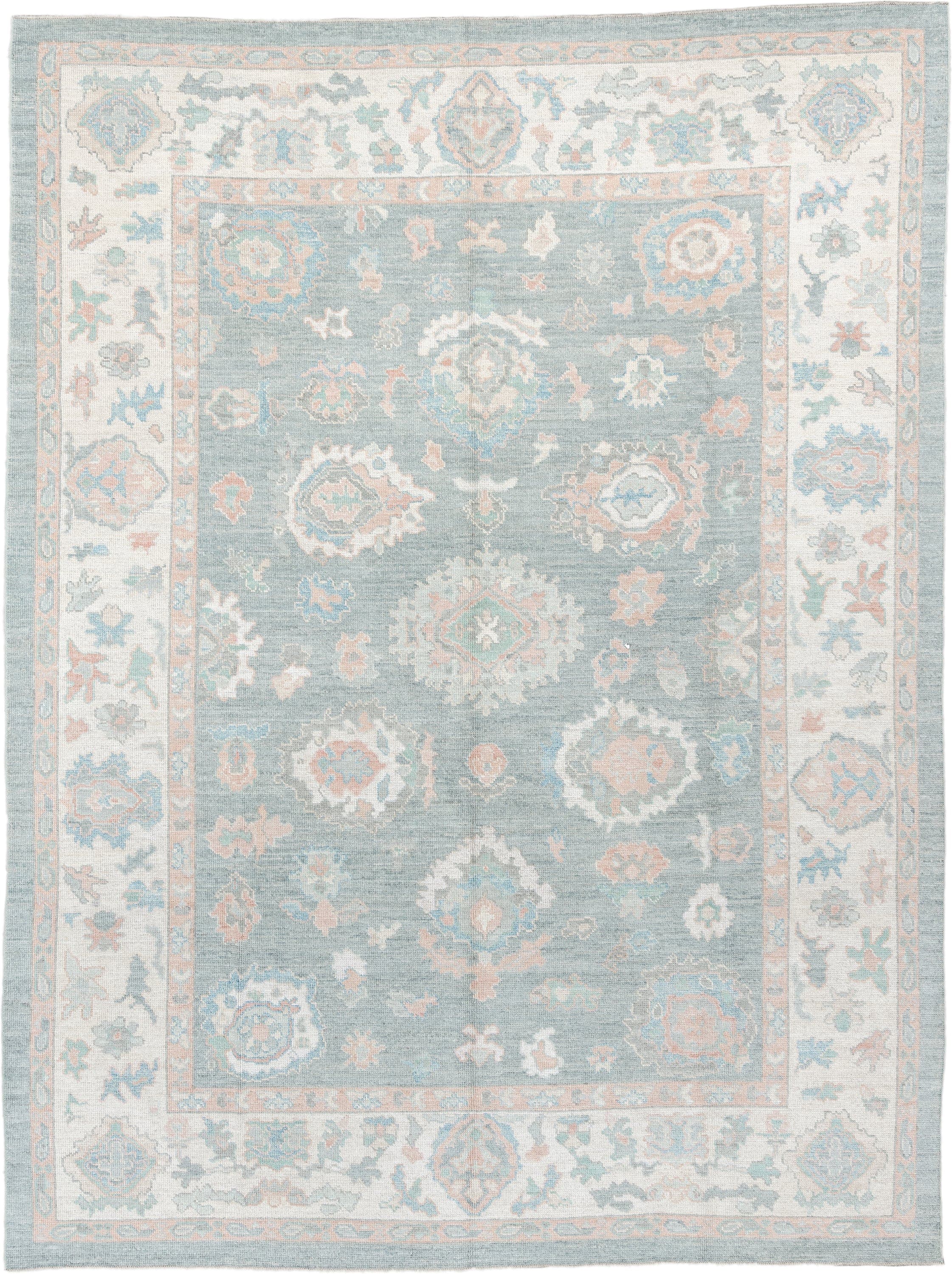 9' x 12' one-of-a-kind handmade vintage Oushak large size rug. Color palette: pale blue, ivory, blush, sage, peach, taupe