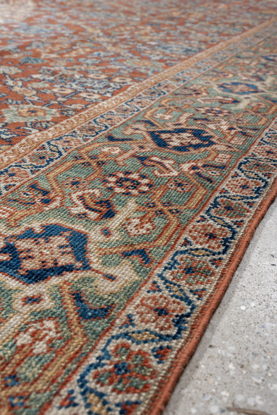 9' x 13' one-of-a-kind handmade antique Mahal large size rug. Color palette: terracotta, ivory, sky blue, navy, sage, taupe
