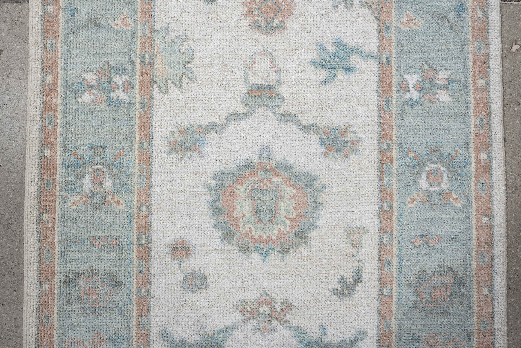 3' x 14' one-of-a-kind handmade vintage Oushak runner rug. Color palette: ivory, aqua, blush, sage, pale blue, taupe, teal