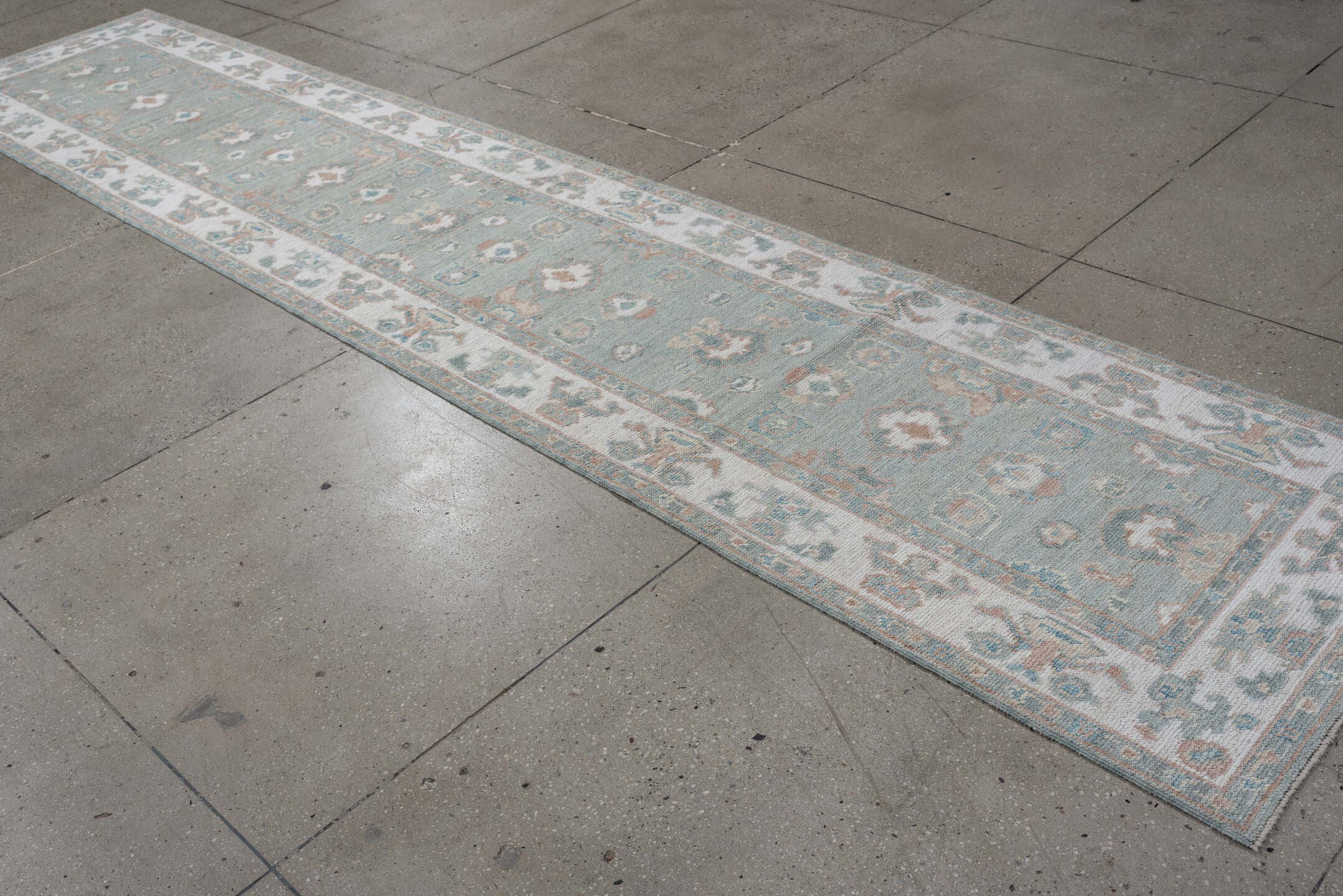 2' x 14' one-of-a-kind handmade vintage Oushak runner rug. Color palette: aqua, ivory, blush, taupe, sage, teal, pink, beige