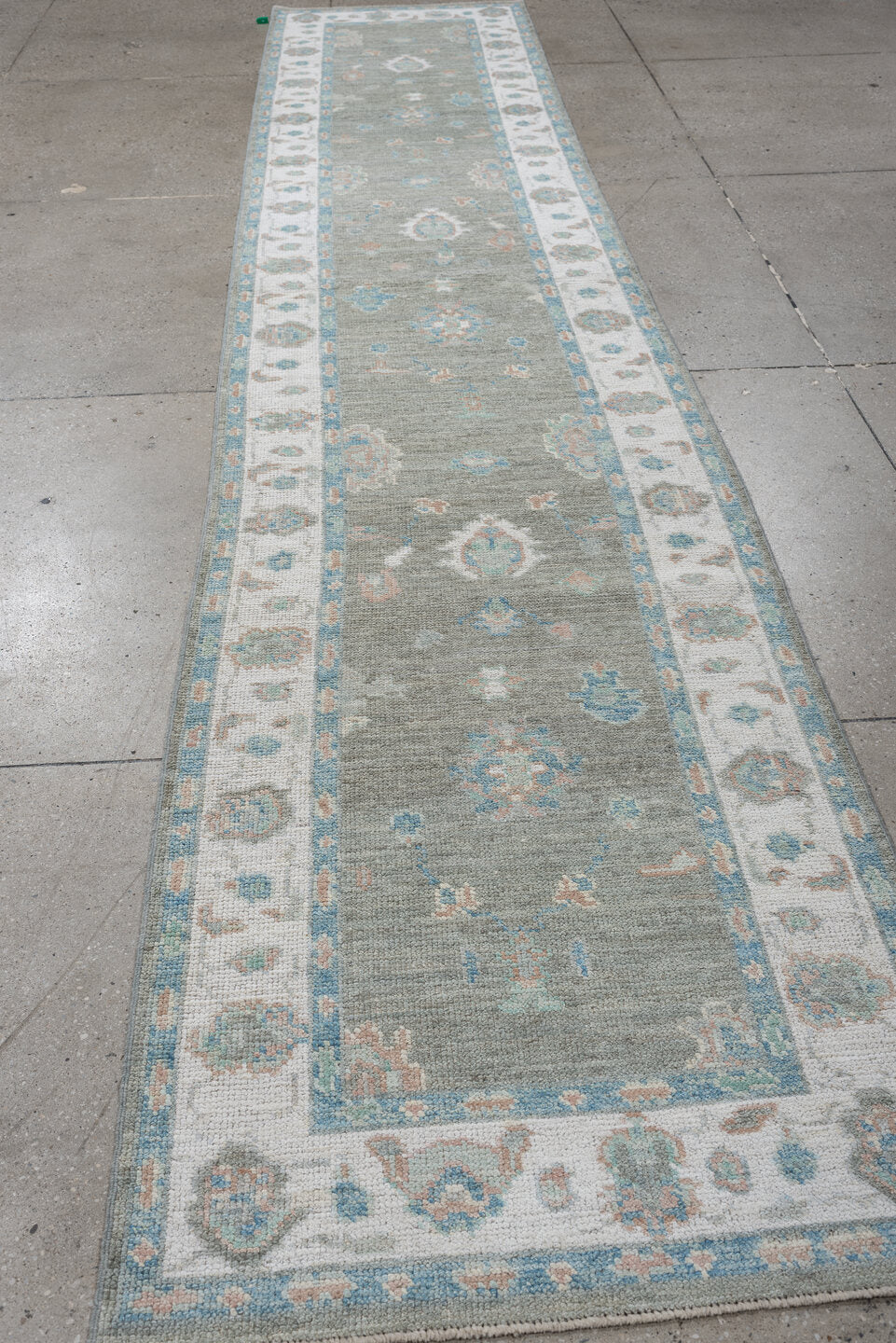 3' x 14' one-of-a-kind handmade vintage Oushak runner rug. Color palette: light gray, ivory, pale aqua, blush, taupe, teal
