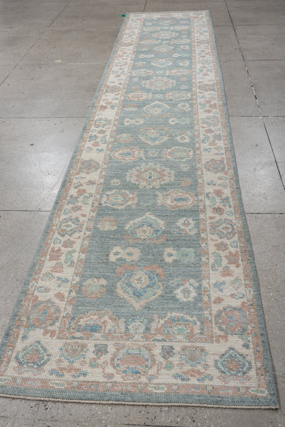 3' x 14' one-of-a-kind handmade vintage Oushak runner rug. Color palette: sky blue, ivory, blush, terracotta, sage, taupe