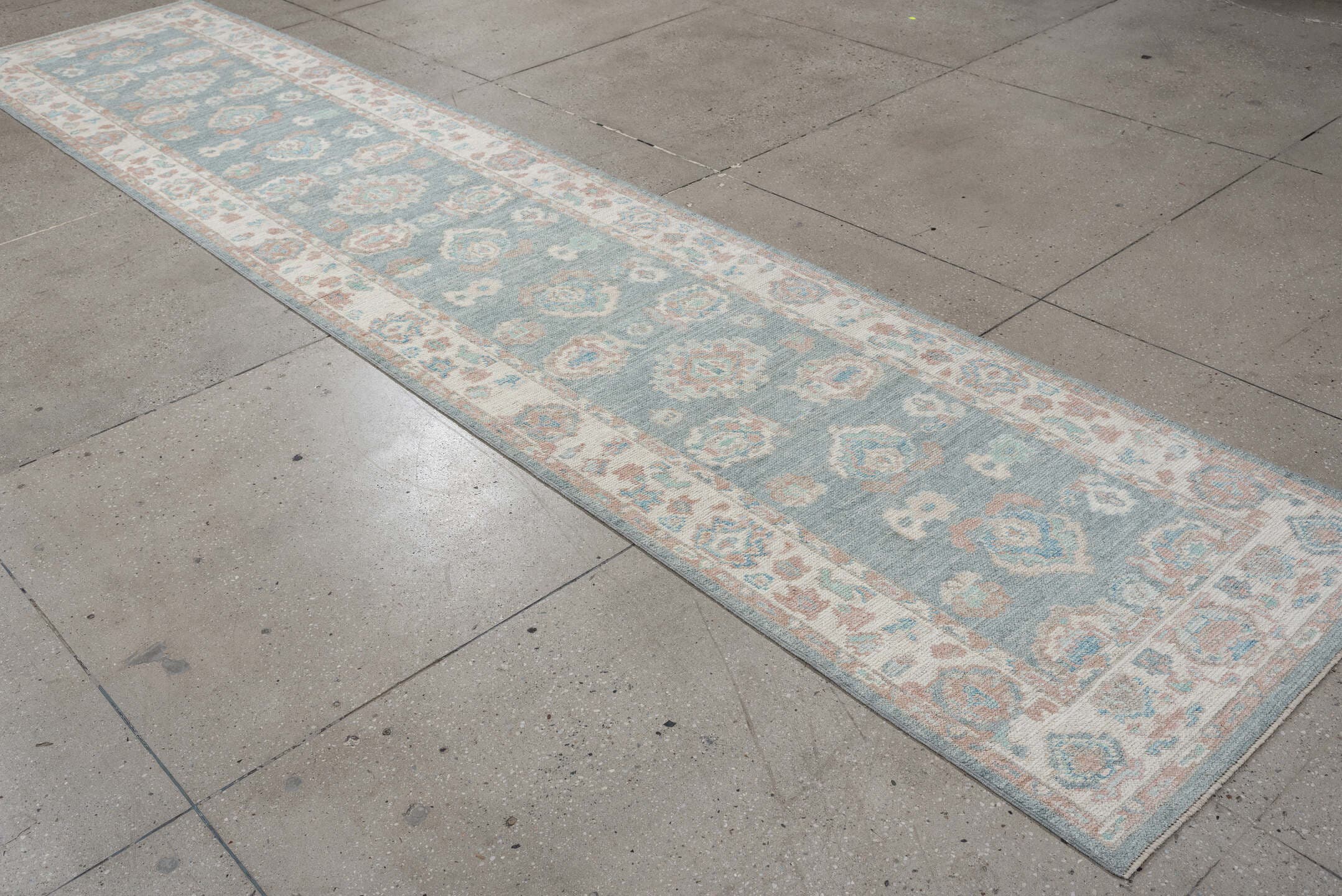 3' x 14' one-of-a-kind handmade vintage Oushak runner rug. Color palette: sky blue, ivory, blush, terracotta, sage, taupe