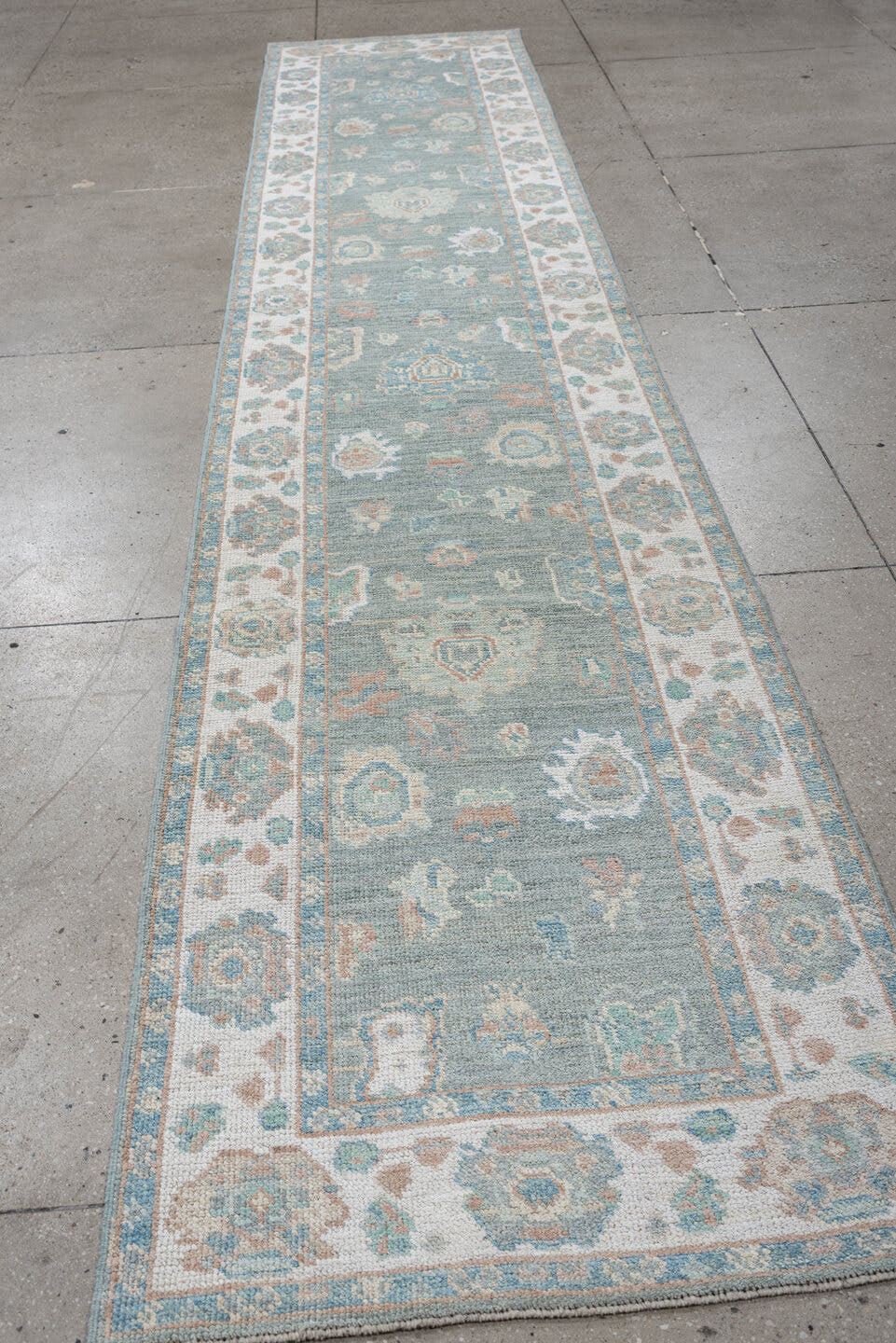 2' x 14' one-of-a-kind handmade vintage Oushak runner rug. Color palette: light blue, ivory, taupe, sage, peach, beige, gray