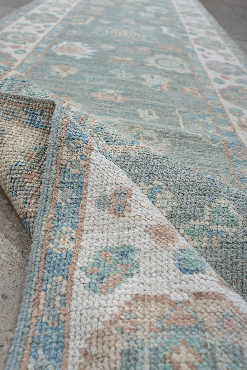 2' x 14' one-of-a-kind handmade vintage Oushak runner rug. Color palette: light blue, ivory, taupe, sage, peach, beige, gray