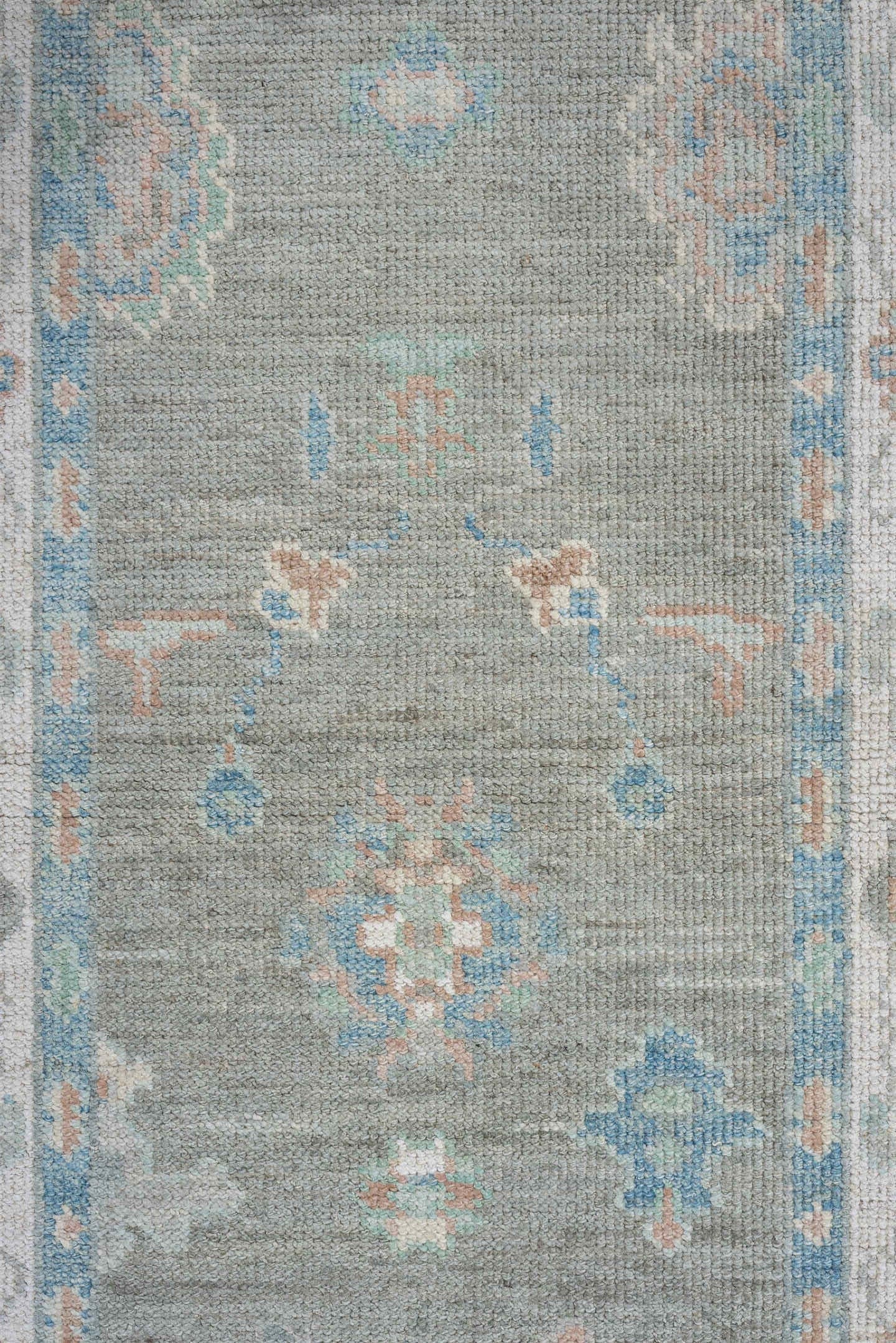 3' x 12' one-of-a-kind handmade vintage Oushak runner rug. Color palette: sage, ivory, aqua, blush, taupe, cream, green