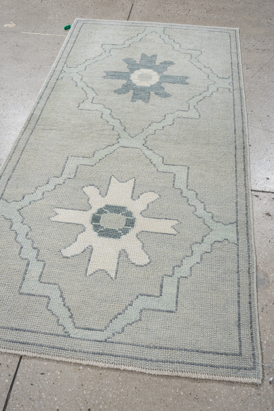 3' x 6' one-of-a-kind handmade vintage Oushak runner rug. Color palette: ivory, light blue, pale gray, cream, light gray