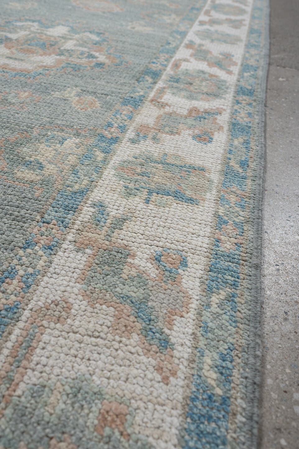 3' x 12' one-of-a-kind handmade vintage Oushak runner rug. Color palette: sky blue, ivory, beige, taupe, sage, light blue