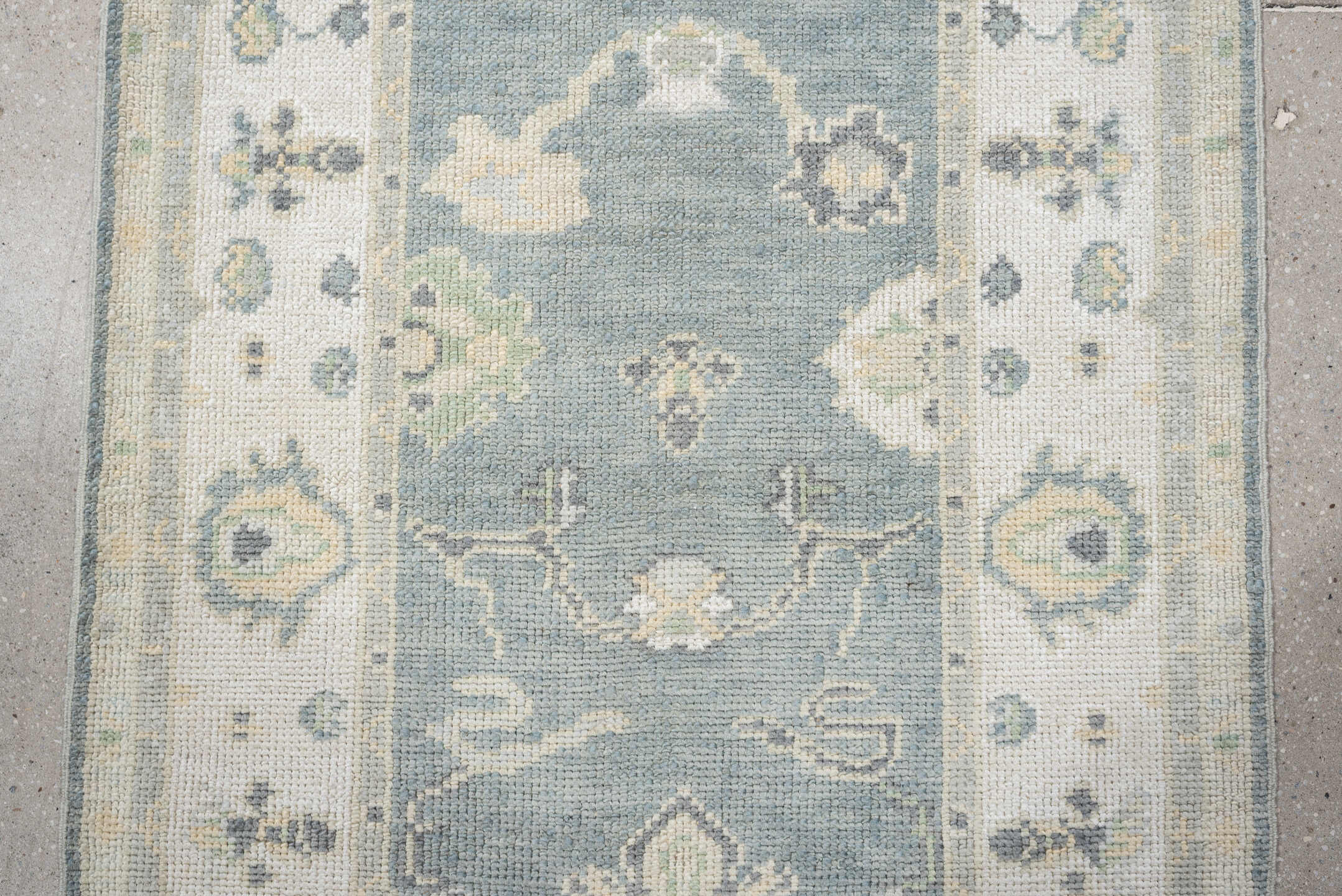 3' x 9' one-of-a-kind handmade vintage Oushak runner rug. Color palette: pale blue, ivory, sage, taupe, slate, cream