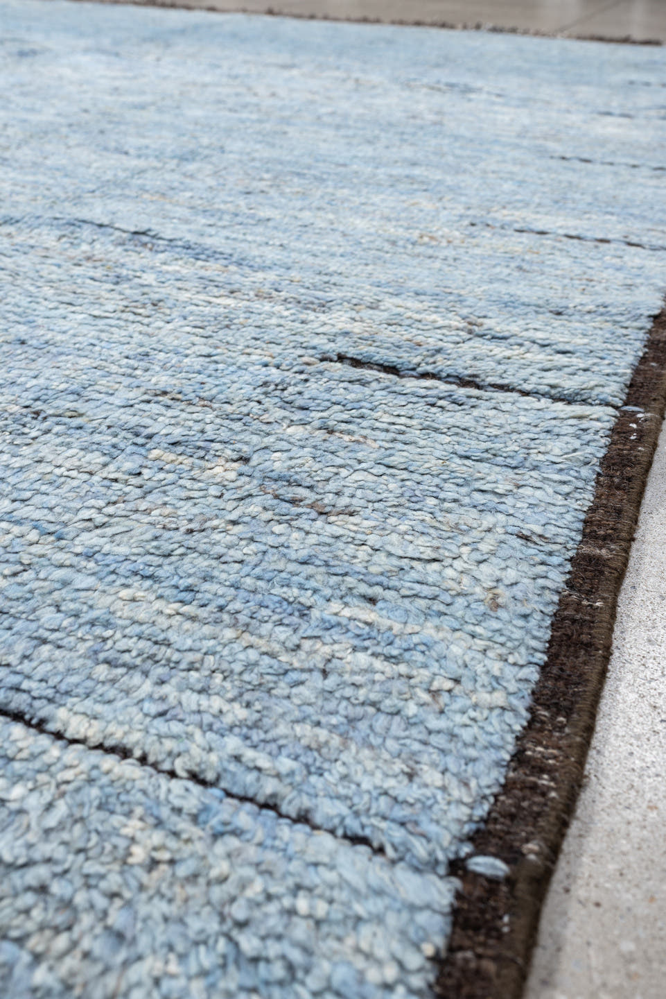 8' x 10' one-of-a-kind handmade vintage Tulu large size rug. Color palette: powder blue, brown, ivory, charcoal, light blue